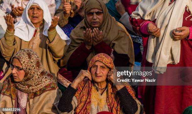 Kashmiri Muslim women devotees pray at Hazratbal shrine on the Friday following, Eid-e-Milad , or the birth anniversary of Prophet Mohammad on...