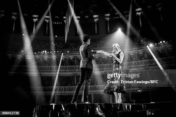 Jack Whitehall and Karlie Kloss on stage during The Fashion Awards 2017 in partnership with Swarovski at Royal Albert Hall on December 4, 2017 in...