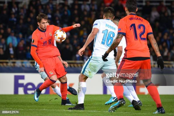 Adnan Januzaj of Real Sociedad vies with Christian Noboa of Zenit during the UEFA Europa League Group L football match between Real Sociedad and...