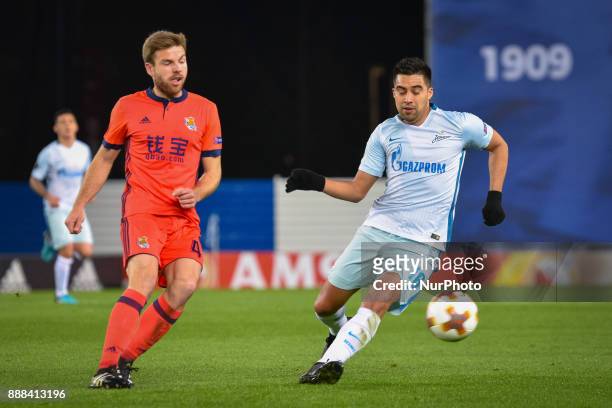 Christian Noboa of Zenit duels for the ball with Illarramendi of Real Sociedad during the UEFA Europa League Group L football match between Real...