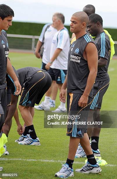Marseille football club's midfielder Atem Ben Arfa arrives for a training session during the club's summer trainning camp on July 5, 2009 in Evian,...