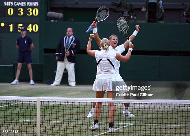 Mark Knowles of Bahamas and Anna-Lena Groenefeld of Germany celebrate victory during the mixed doubles final match against Leander Paes of India...