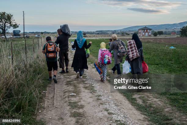 Syrian refugee family walking on October 5, 2017.