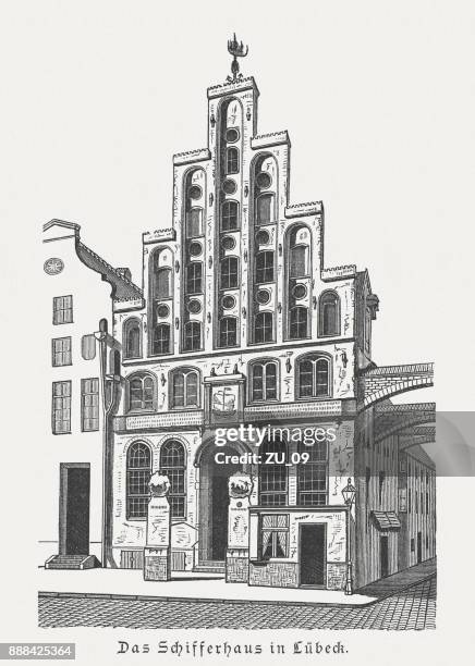 seafarers' guild (schiffergesellschaft) in lübeck, germany, wood engraving, published 1887 - pediment stock illustrations