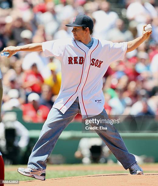 Mark Wahlberg throws out the ceremonial first pitch before the Boston Red Sox versus the Seattle Mariners game on July 5, 2009 at Fenway Park in...