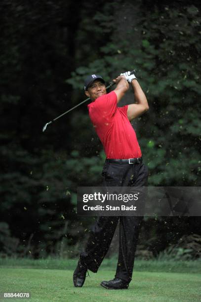Tiger Woods hits from the 13th tee box during the final round of the AT&T National at Congressional Country Club on July 5, 2009 in Bethesda,...
