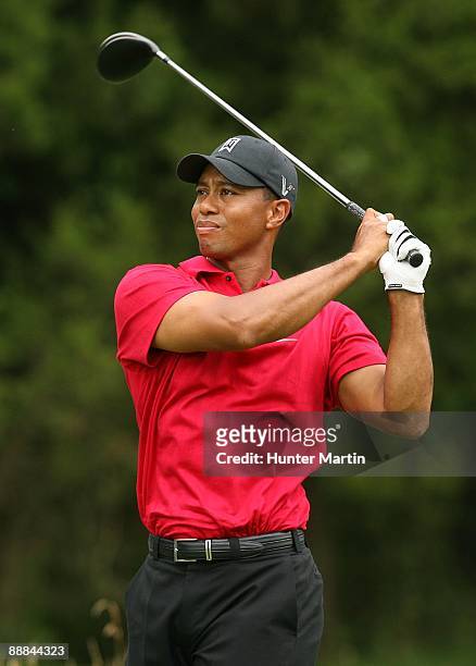 Tiger Woods hits his tee shot on the sixth hole during the final round of the AT&T National hosted by Tiger Woods at Congressional Country Club on...