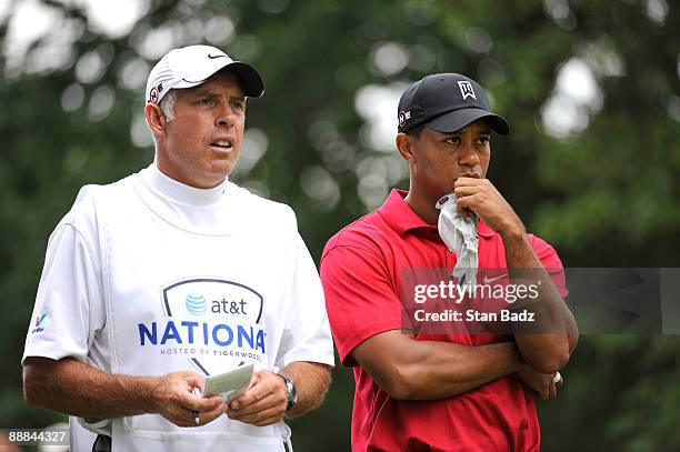 Tiger Woods waits for play at the seventh tee box during the final round of the AT&T National at Congressional Country Club on July 5, 2009 in...