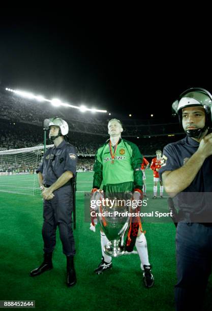 Peter Schmeichel of Manchester United with the European Cup after victory in the UEFA Champions League Final between Manchester United and Bayern...