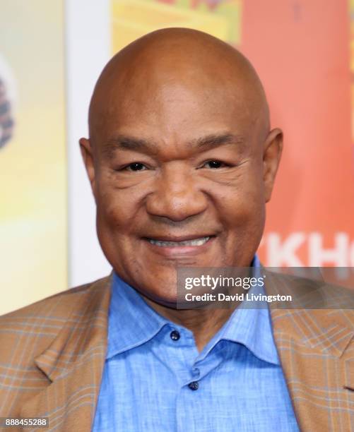 Personality George Foreman attends the premiere of NBC's "Better Late Than Never" at Universal Studios Hollywood on November 29, 2017 in Universal...