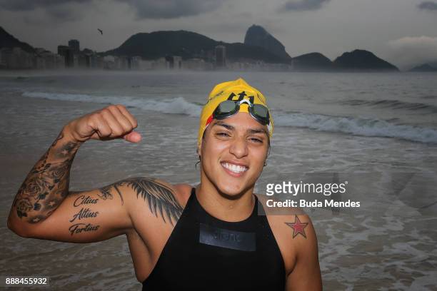 Brazilian Marathon Swimming competitor Ana Marcela Cunha poses for photographers during a grid start-up match and press conference at Copacabana...