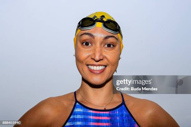 Brazilian Marathon Swimming competitor Poliana Okimoto poses for photographers during a grid start-up match and press conference at Copacabana beach...