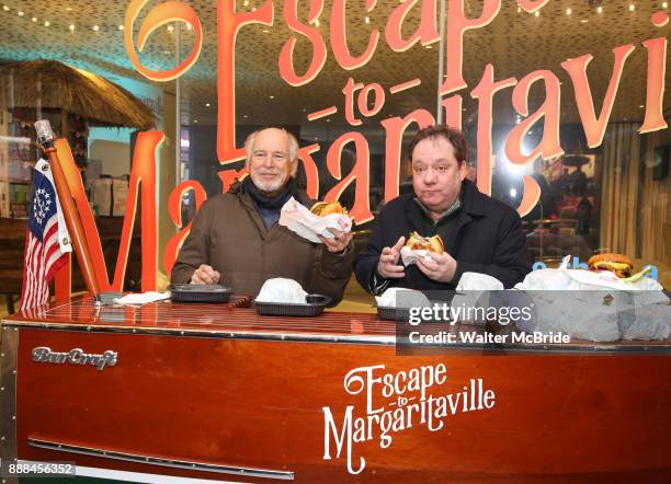 Jimmy Buffett and James Nederlander Jr. Hand out free hamburgers as they offically open up the Box Office for his Broadway Musical 'Escape To...