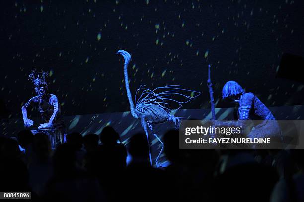 Traditional African dancers perform during the official opening ceremony of the second Pan-African Cultural Festival late on July 5, 2009 in Algiers....