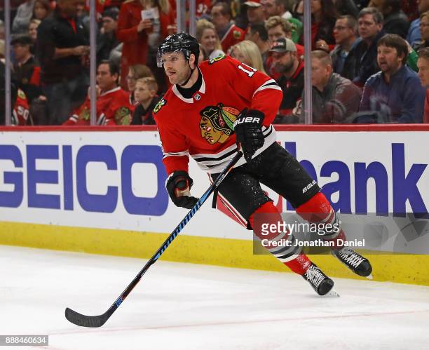Cody Franson of the Chicago Blackhawks controls the puck against the Dallas Stars at the United Center on November 30, 2017 in Chicago, Illinois. The...