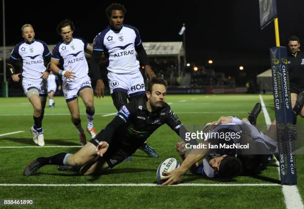 Kelian Galletier of Montpellier scores his teams first try during the European Rugby Champions Cup match between Glasgow Warriors and Montpellier at...