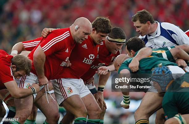 Lions front row from left John Hayes, Ross Ford and Andrew Sheridan prepares to scrum down during the Third Test match between South Africa and The...