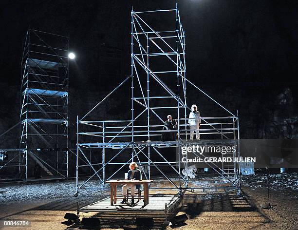 Actors Jeanne Moreau , Jerome Koenig and Gerard Benhamou perform a scene of the play "La Guerre des fils de lumière contre les fils des ténèbres"...