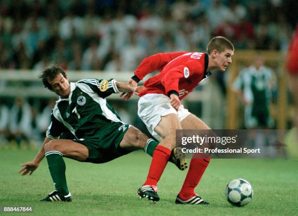 Steven Gerrard of England gets away from Mehmet Scholl of Germany during a UEFA Euro 2000 group match at the Stade du Pays de Charleroi on June 17,...