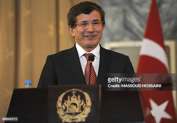 Turkish Foreign Minister Ahmet Davutoglu speaks during a joint press conference with Afghan Minister of Foreign Affairs Rangeen Dadfar Spantain in...