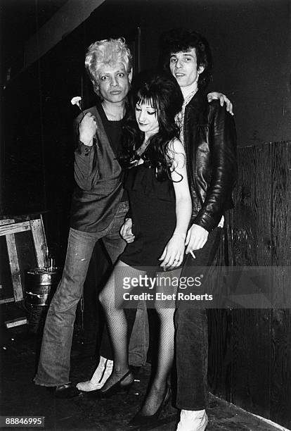 Alan Vega of Suicide , Willy DeVille of Mink DeVille with his wife Toots at Max's Kansas City on January 14th,1977 in New York.