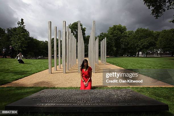 Saba Mozakka 28, the daughter of Behmaz Mozakka who died at Kings Cross on July 7, 2005 sits with a plaque with the names of the victims of the July...