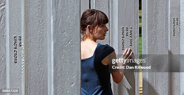 Woman walks around a new permanent memorial to honour the victims of the July 7 2005 London bombings in Hyde park on July 6, 2009 in London, England....