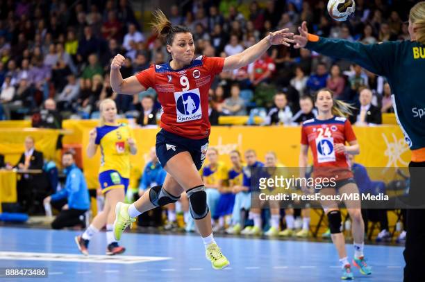Nora Mork of Norway scores a goal during IHF Women's Handball World Championship group B match between Norway and Sweden on December 08, 2017 in...