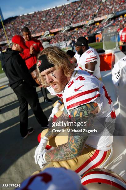 Cassius Marsh of the San Francisco 49ers sits on the bench during the game against the Chicago Bears at Soldier Field on December 3, 2017 in Chicago,...