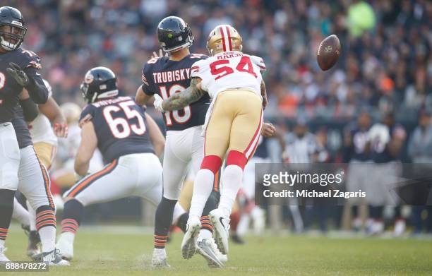 Cassius Marsh of the San Francisco 49ers strips the ball from Mitchell Trubisky of the Chicago Bears during the game at Soldier Field on December 3,...