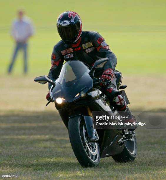 Prince William leaves Coworth Polo Club on his Ducati motorbike after playing in the Westbury Shield charity polo match on July 5, 2009 in Ascot,...