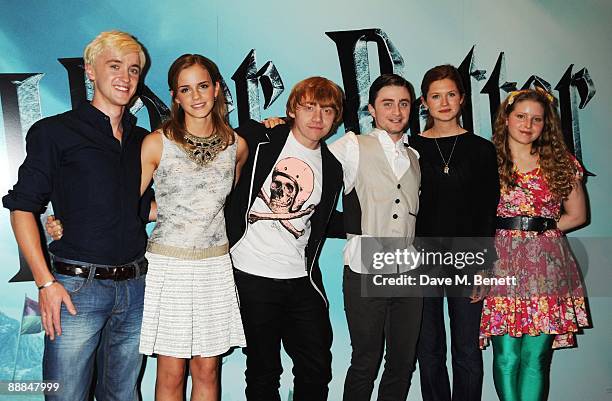Tom Felton, Emma Watson, Rupert Grint, Daniel Radcliffe, Bonnie Wright and Jessie Cave pose during the photocall of 'Harry Potter And The Half-Blood...