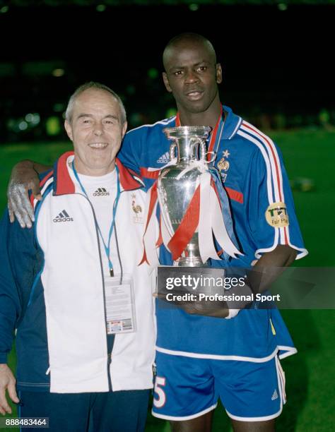 Lilian Thuram of France celebrates with the trophy after victory in the UEFA Euro 2000 Final between France and Italy at the Feijenoord Stadium on...