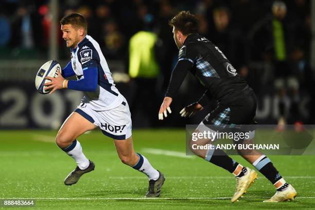 Montpellier's French scrum-half Enzo Sanga makes a break during the European Champions Cup pool 3 rugby union match between Glasgow Warriors and...