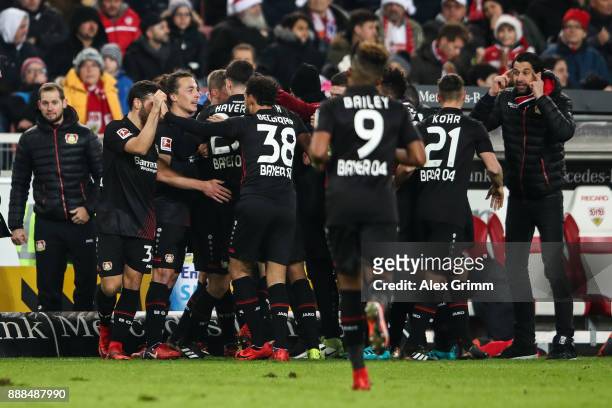 Lars Bender of Bayer Leverkusen celebrates with his team-mates after scoring his team's second goal to make it 0:1 during the Bundesliga match...