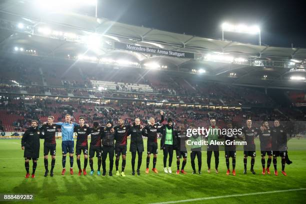 Team of Leverkusen celebrates after winning the Bundesliga match between VfB Stuttgart and Bayer 04 Leverkusen at Mercedes-Benz Arena on December 8,...