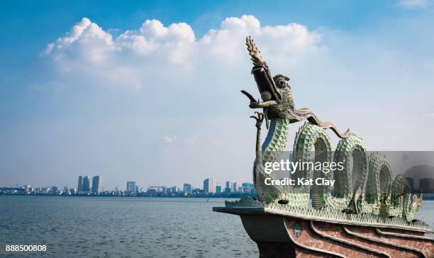 dragon statue at west lake - hanoi cityscape stock pictures, royalty-free photos & images