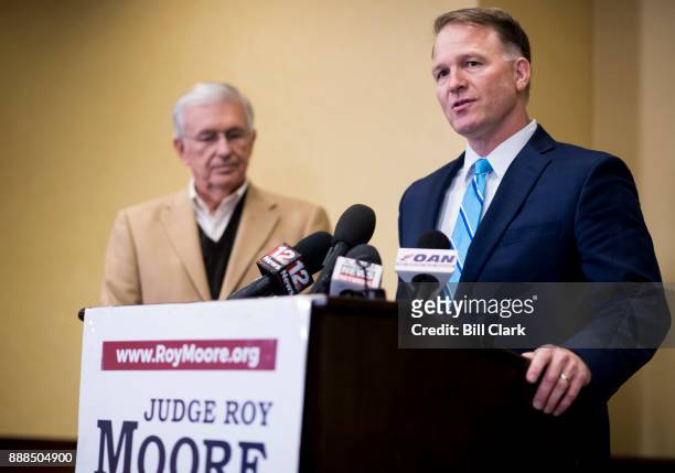 Phillip Jaurequi, attorney for Senate candidate Roy Moore, right, speaks as Moore campaign chairman Bill Armistead listens during a press conference...