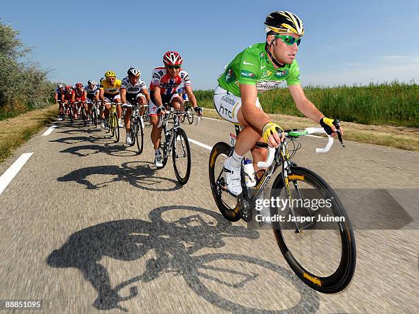 Stage winner Mark Cavendish of Great Britain and Team Columbia HTC rides in his green jersey on his way to victory during stage three of the 2009...