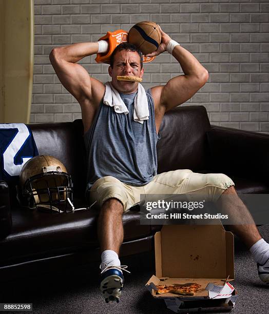 football player with pizza in mouth looking frustrated - angry fans stock pictures, royalty-free photos & images