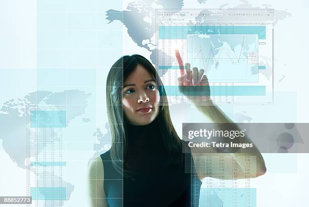 mid-adult woman pointing on world map - jersey city map stock pictures, royalty-free photos & images