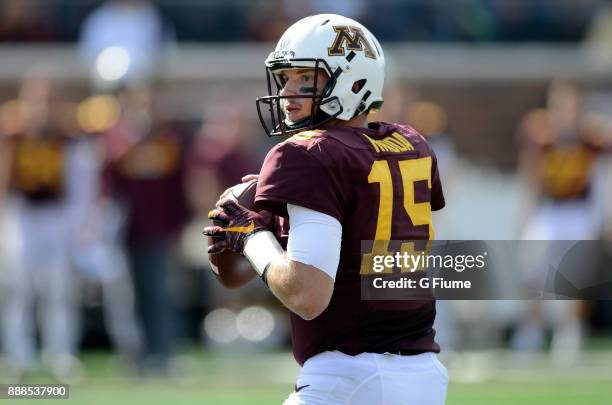 Conor Rhoda of the Minnesota Golden Gophers drops back to pass against the Maryland Terrapins at TCFBank Stadium on September 30, 2017 in...