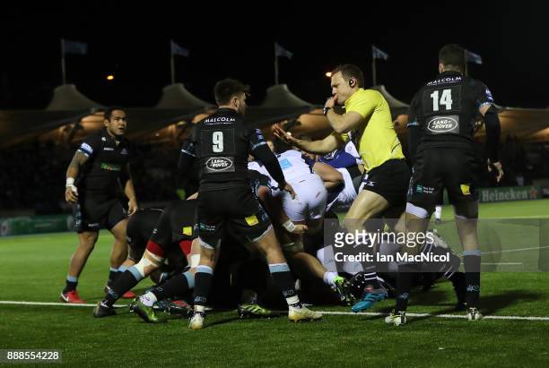 Referee Matthew Carley awards Montpellier a penalty try during the European Rugby Champions Cup match between Glasgow Warriors and Montpellier at...