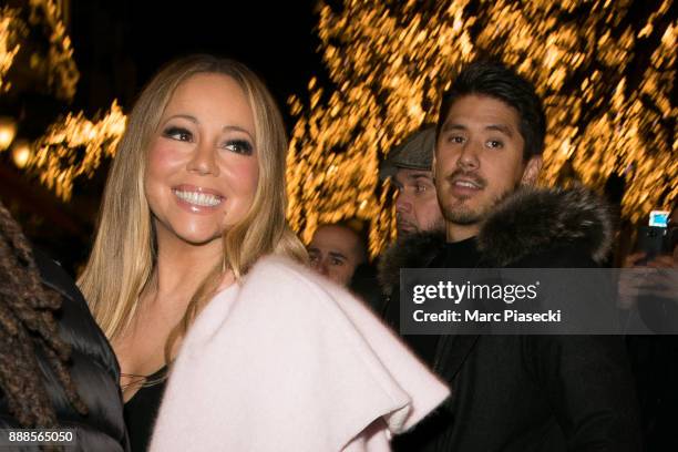 Bryan Tanaka and singer Mariah Carey are seen on December 8, 2017 in Paris, France.