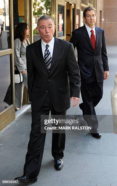 Attorneys John Branca and Howard Weitzman leave the Superior Court in Los Angeles on July 6, 2009 after they were appointed co-administrators of...