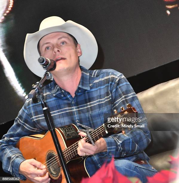 Recording artist Ned LeDoux performs during the "Outside the Barrel" with Flint Rasmussen show during the National Finals Rodeo's Cowboy Christmas at...