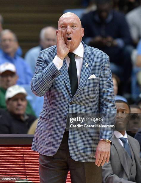 Head coach Mike Dunleavy Sr. Of the Tulane Green Wave directs his team against the North Carolina Tar Heels during their game at the Dean Smith...