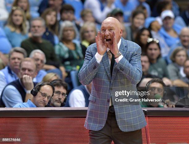 Head coach Mike Dunleavy Sr. Of the Tulane Green Wave directs his team against the North Carolina Tar Heels during their game at the Dean Smith...