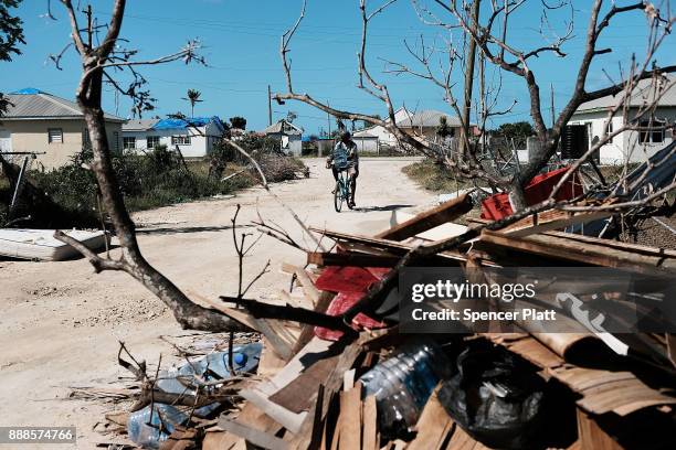 Debris from damaged homes lines a street on the nearly destroyed island of Barbuda on December 8, 2017 in Cordington, Barbuda. Barbuda, which covers...