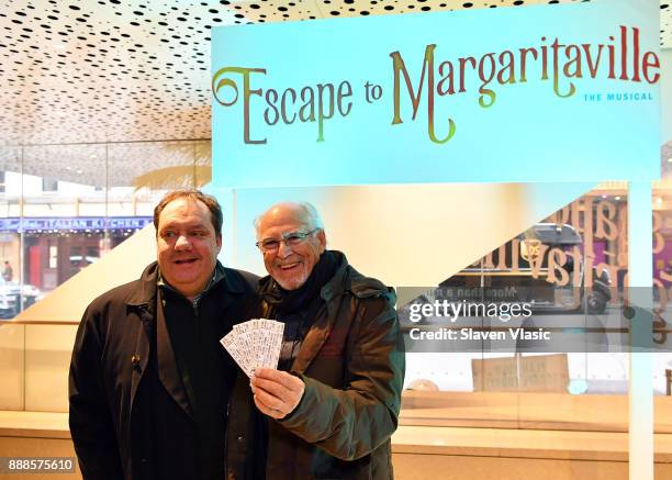 Theatre producer James L. Nederlander and Jimmy Buffett help open Box Office for "Escape To Margaritaville" on Broadway at Marquis Theatre on...